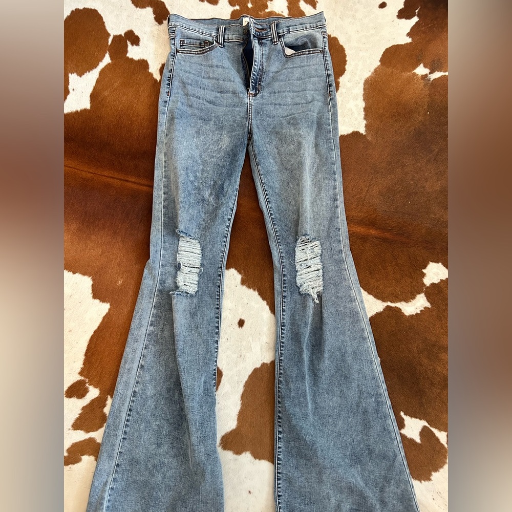 Sneak Peak Distressed Flared Jeans